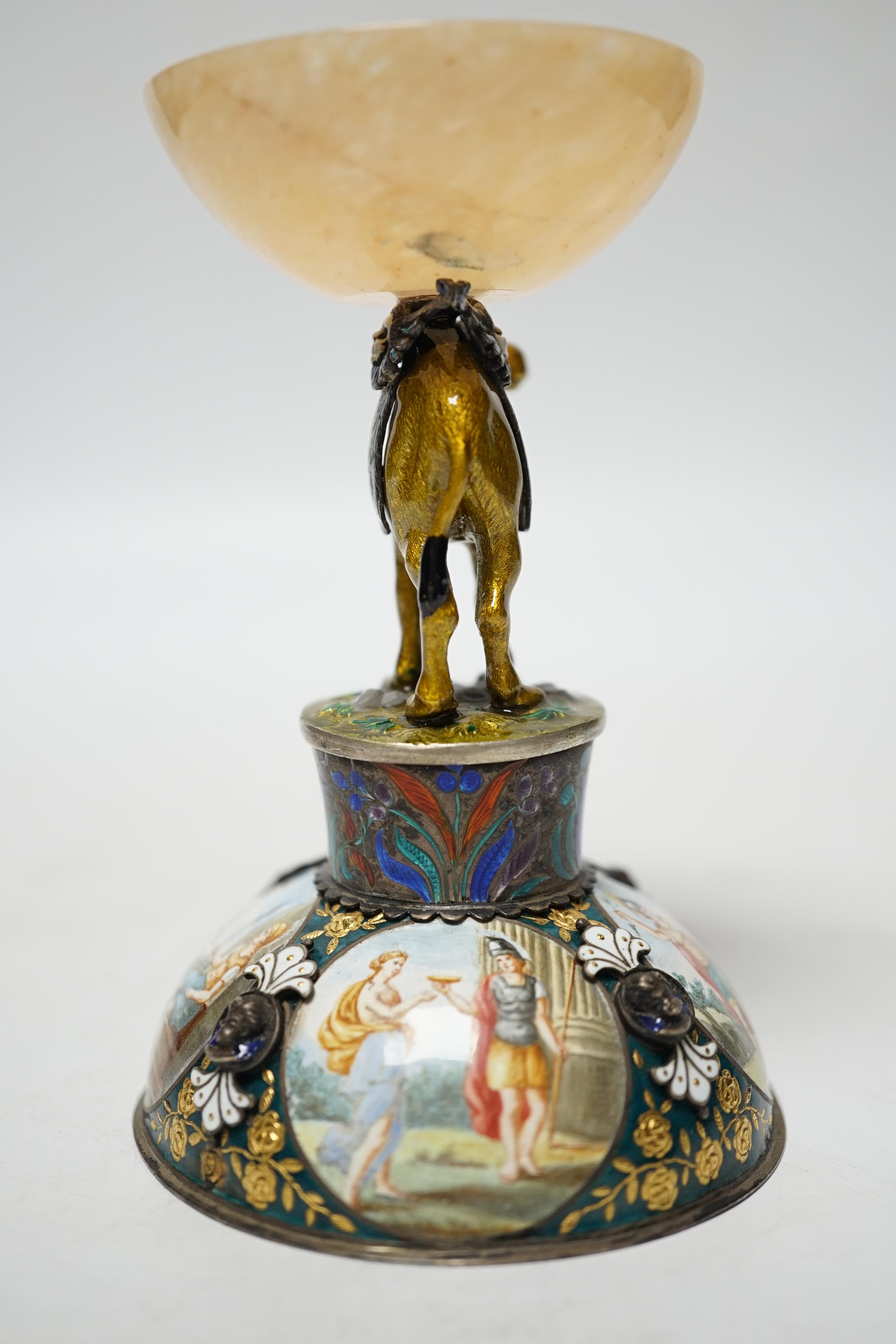 A 19th century Viennese? white metal, polychrome enamel and onyx mounted small centrepiece decorated with figural scenes, the stem in the form of a camel, height 10.7cm.